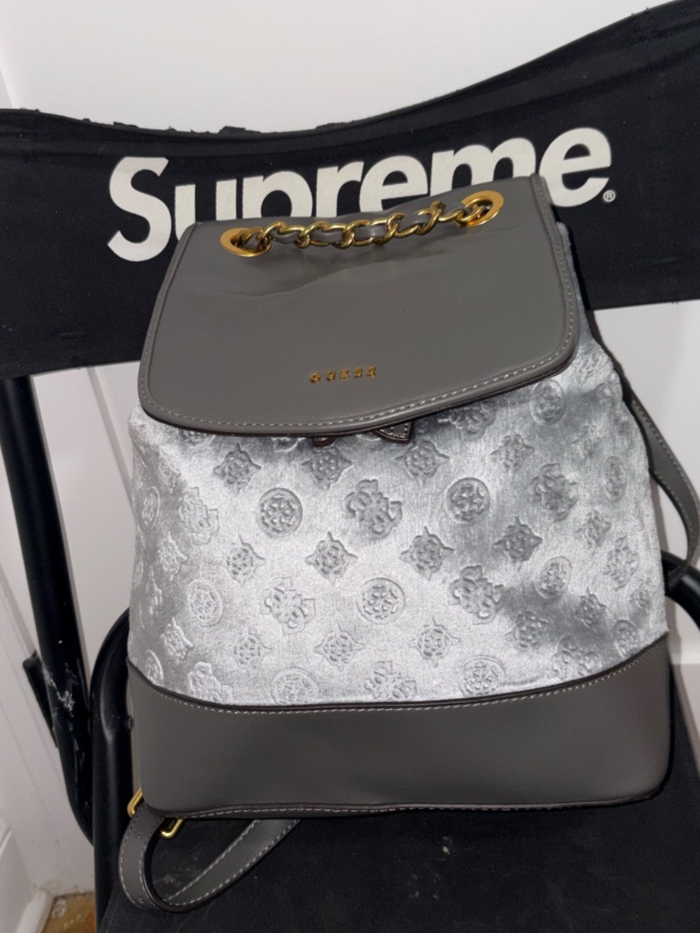 Guess Gray Drawstring Backpack with Gold Chain Accent